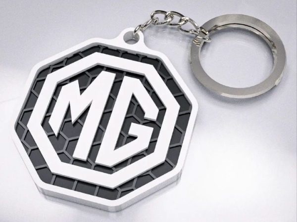 Brelok logo MG